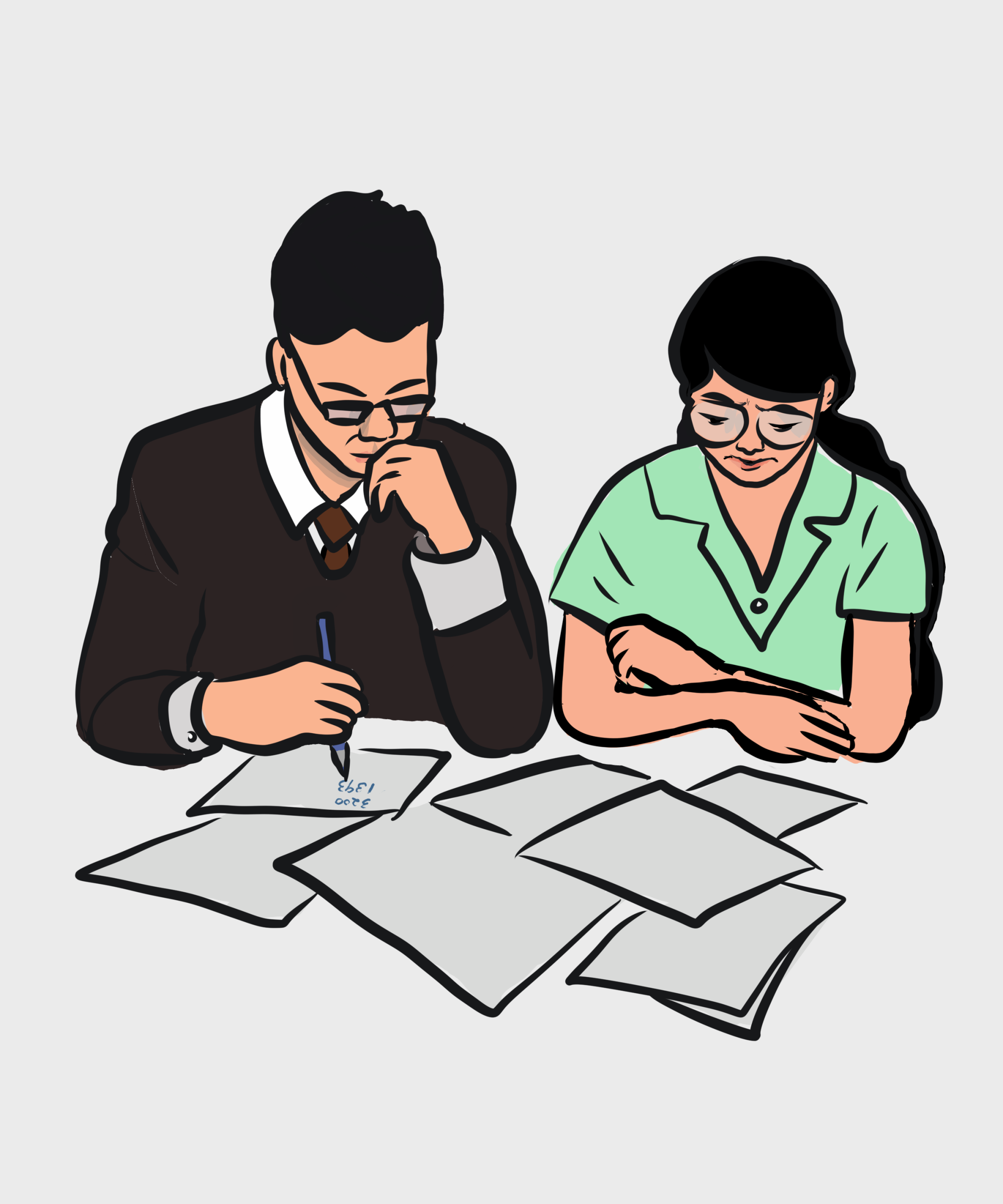 Dos personas revisando documentos juntas.